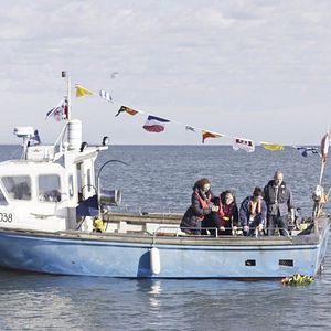 Photo Souffler plus fort que la mer