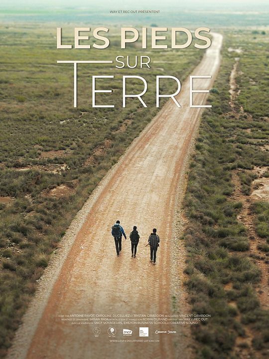 Les pieds sur terre : Affiche