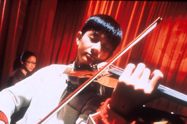 L'Enfant au violon : Photo Yun Tang